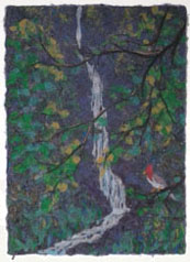 cardinal bird by waterfall